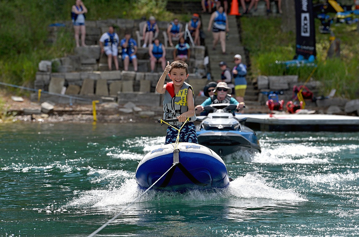 boy in inflatable water ski